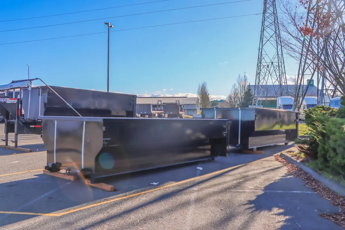 Roll-off dumpster ready for waste disposal at job site for 15 Yard Dumpster Rental in Melbourne